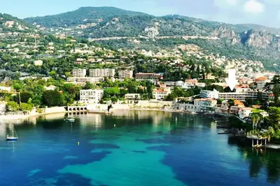 a view of a river with a city at La Suite de Saint-Jean-Cap-Ferrat, vue mer et accès mer in Saint-Jean-Cap-Ferrat