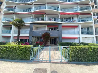 an apartment building with a gate in front of it at SEA FRONT View Top Roof Flat in Nice
