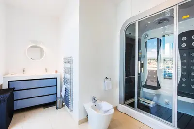 a bathroom with a shower and a sink at LE CAP DE NICE VI4150 by RIVIERA HOLIDAY HOMES in Nice
