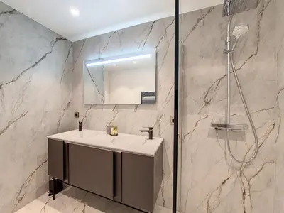 a bathroom with a sink and a shower at Nestor&Jeeves - BELLE ETOILE - Central - Premium in Nice