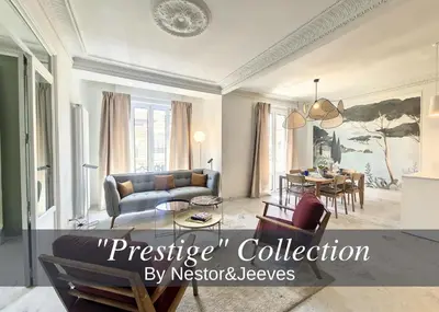 a living room with a couch and a table at Nestor&Jeeves - SEAHORSE - Central - Proche mer in Nice