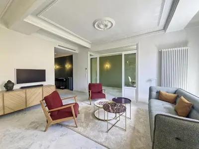a living room with a couch and a tv at Nestor&Jeeves - SEAHORSE - Central - Proche mer in Nice