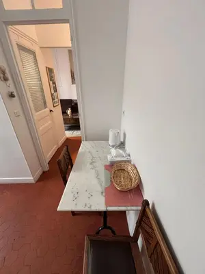 a table with a plate on top of it at Studio Au coeur de Nice in Nice