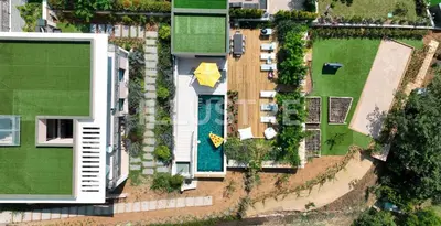an overhead view of a house with a swimming pool at Villa Vue Mer, Piscine & Plage à 6Min in Cagnes-sur-Mer