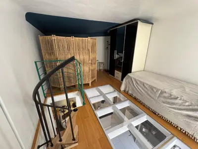 a room with a bed in a room with a room at Duplex spagiari in Nice