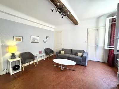 a living room with a couch and chairs and a table at ApartHotel Riviera - BARILLERIE 4 - 3 pieces - Old Town Promenade Anglais in Nice
