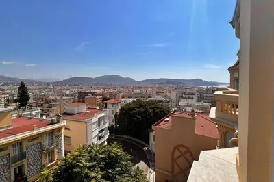 a view of a city from a building at Le Palais Riviera in Nice