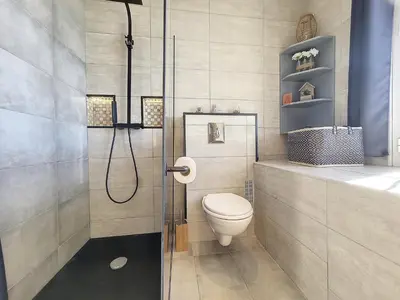 a bathroom with a toilet and a shower at Nestor&Jeeves - PALAIS HISPANIA - Top floor apartment in Nice