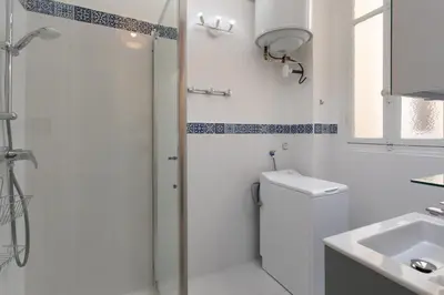 a bathroom with a shower and a toilet and a sink at 26 Nice Parc Imperial studio in Nice