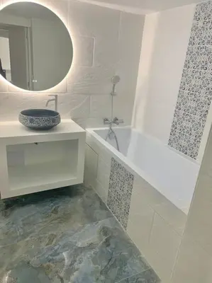 a white bathroom with a sink and a mirror at Nouveau - Nice Mamac - centre in Nice