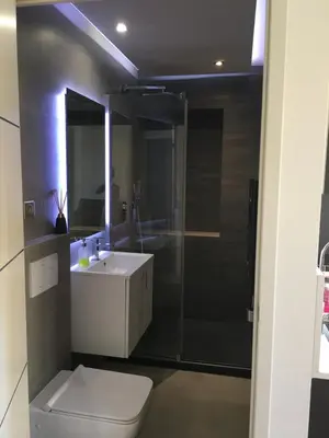 a bathroom with a toilet and a sink and a shower at Magnifique studio carré d’or in Nice