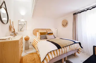 a bedroom with a bed with a desk and a mirror at Nice Renting - NEUVE - Luxury Triplex Old Town Massena Garibaldi - 4 BedRoom - AC in Nice