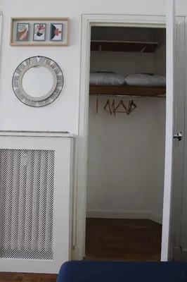 a room with a mirror and a closet at Le Grand Sud in Nice