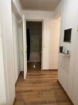 an empty room with a hallway leading to a bathroom at MY CASA - BOSIO RAOUL - Central few steps to the sea in Nice