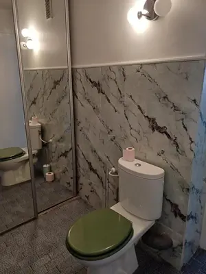 a kitchen with a sink and a microwave at Charmant F1 proche du tramway et plages in Nice