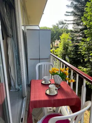 a bottle of wine and a wine glass on a counter at Cros de Cagnes, apartment with the Best Location in Cagnes-sur-Mer