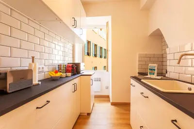a kitchen with a sink and a counter top at THE BAY AP4371 By Riviera Holiday Homes in Villefranche-sur-Mer