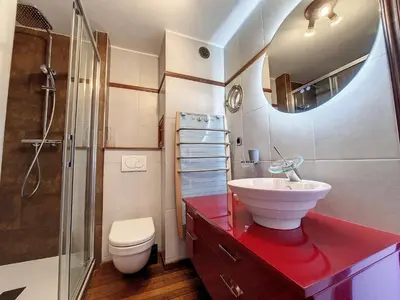 a bathroom with a sink and a shower and a toilet at Nestor&Jeeves - HUBLOT TERRASSE - Sea view - swimming pool in Nice