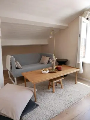 a living room with a couch and a table at LOVELY STUDIO - Port de Nice in Nice