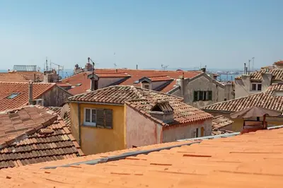 a view of roofs of a city with buildings at #49 Perfect location Saleya old town 2mins to Sea AC in Nice