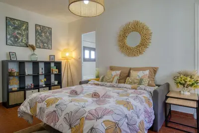 a living room with a couch and a table at Cosy, modern, fully equipped, air conditioning, Nice historical, old town, 1minute walk from beach - 