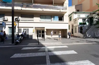 a group of people walking down a city street at L28 Suite Californie 1min walk sea 3BDR/ AC & balcony in Nice