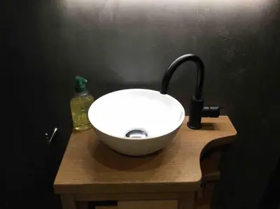 a white bowl sink sitting on top of a counter at Studio de charme au coeur de la vieille ville in Nice
