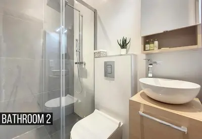 a bathroom with a shower and a sink and a toilet at Nestor&Jeeves - MADAGASCAR - 3 chambres, Centre-ville in Nice