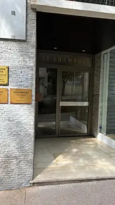 an entrance to a building with a revolving door at Nice Séjour Detente Studio Lumineux Balcon Cuisine Equipée Wifi in Nice