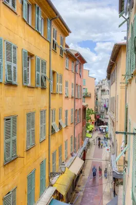 a street in an old town with buildings at 26 nice Vieux Nice in Nice