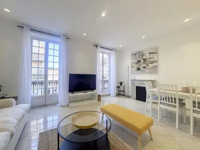 a living room with a couch and a table at Nestor&Jeeves - JACARANDA - Carre d Or, Proche mer in Nice