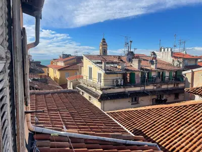 a view of the roofs of a city with buildings at Triplex Toit-Terrasse Authentique Vieux-Nice & Mer in Nice
