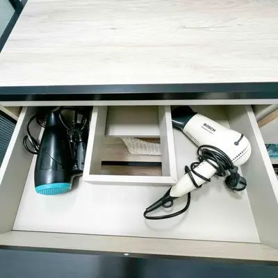 a shelf in a desk with aiger at Beautiful Top Floor & Terrasse (Beach 1' walk) in Nice