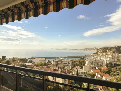 a view of the ocean from a balcony at Le Baccarat - Wifi, AC, vue mer, 4 pers in Nice