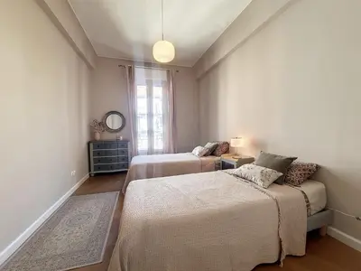 a small bedroom with two beds and a couch at Nestor&Jeeves - BELLE EPOQUE - Central, Close sea in Nice