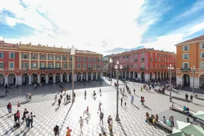 a group of people walking around a plaza in a city at Nestor&Jeeves - ADRIANA - Central, Close sea in Nice