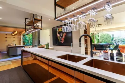 a kitchen with a sink and a large window at Luxury Villa Nice in Nice