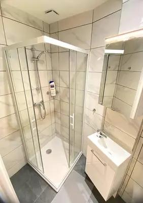 a bathroom with a shower and a sink at Studio cosy - Proche mer et gare in Nice