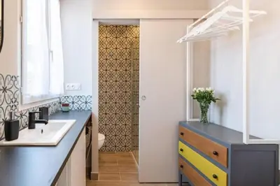 a bathroom with a sink and a toilet at MY CASA - LAMARTINE - Studio w terrace and AC Very central in Nice