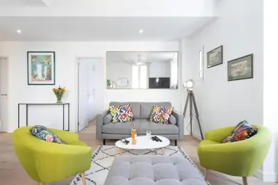 a living room with a couch and two chairs at MY CASA - MOULIN - Stunning 1 bedroom Apt on the Port in Nice