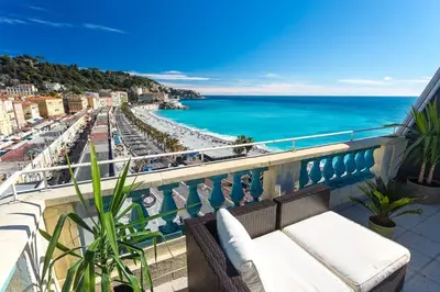 a balcony with a view of the ocean at MY CASA - ETATS UNIS 896 - Magic view rooftop terrace in Nice