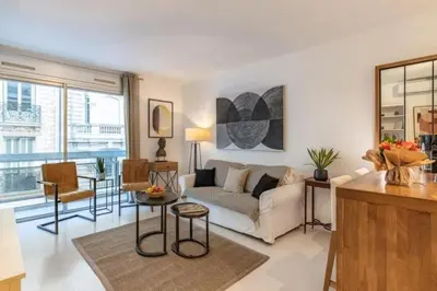 a living room with a couch and a table at MY CASA - ROSSINI - Central and cosy with AC in Nice