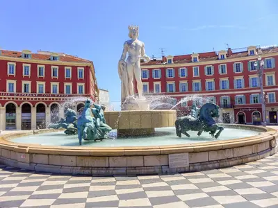 a fountain with a statue in front of a building at Apartment Les Arènes de Cimiez-1 by Interhome in Nice
