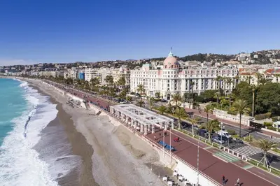 an aerial view of a beach and buildings at appartement carré d'or in Nice