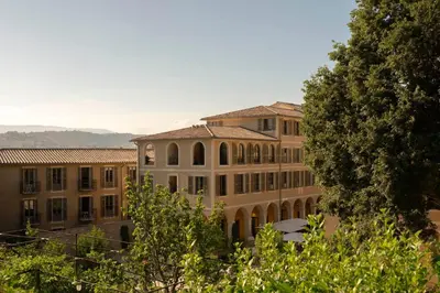 a view of a city with buildings and the ocean at Hôtel du Couvent, a Luxury Collection Hotel, Nice in Nice
