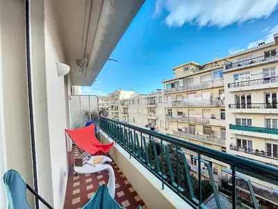 a balcony with chairs and a view of buildings at Nestor&Jeeves - BAIETA - Balcony in Nice