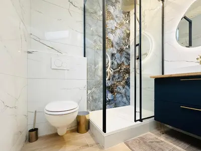 a bathroom with a toilet and a shower at Elegant mansardé-place du pin in Nice
