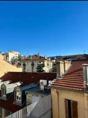 a view of the roofs of buildings in a city at Sweet Home 1 ou Sweet Home 2 Réservez Sweet Home 1 ou Sweet Home 2 ou bien les deux in Nice