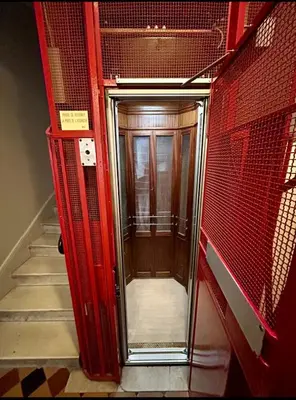 a hallway with a glass door in a building at Sweet Home 1 ou Sweet Home 2 Réservez Sweet Home 1 ou Sweet Home 2 ou bien les deux in Nice