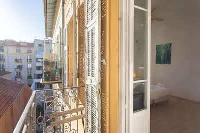 a balcony with a view of a building at #21 2 Bdr balconies 10 mins walk to sea 5mins to tram in Nice